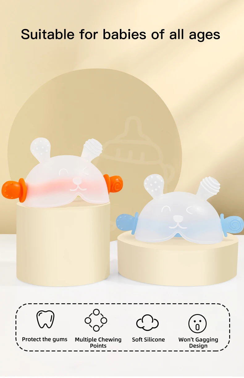A pair of soft silicone bunny-shaped baby teethers in pink and blue are displayed on a white stand.