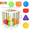 A set of six colorful rattles and toys including a cube, ball, and various shapes for sensory play.