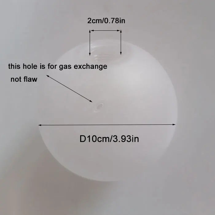 A white frosted glass dome lampshade with a small hole for gas exchange and a diameter of 10cm.