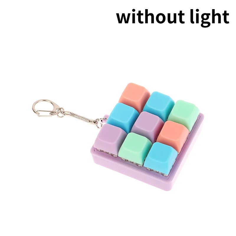 A purple plastic case holding six colorful LED mechanical keychain fidget toys without light.