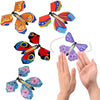 A set of ten magic flying butterfly wind-up toys in various colors and designs.