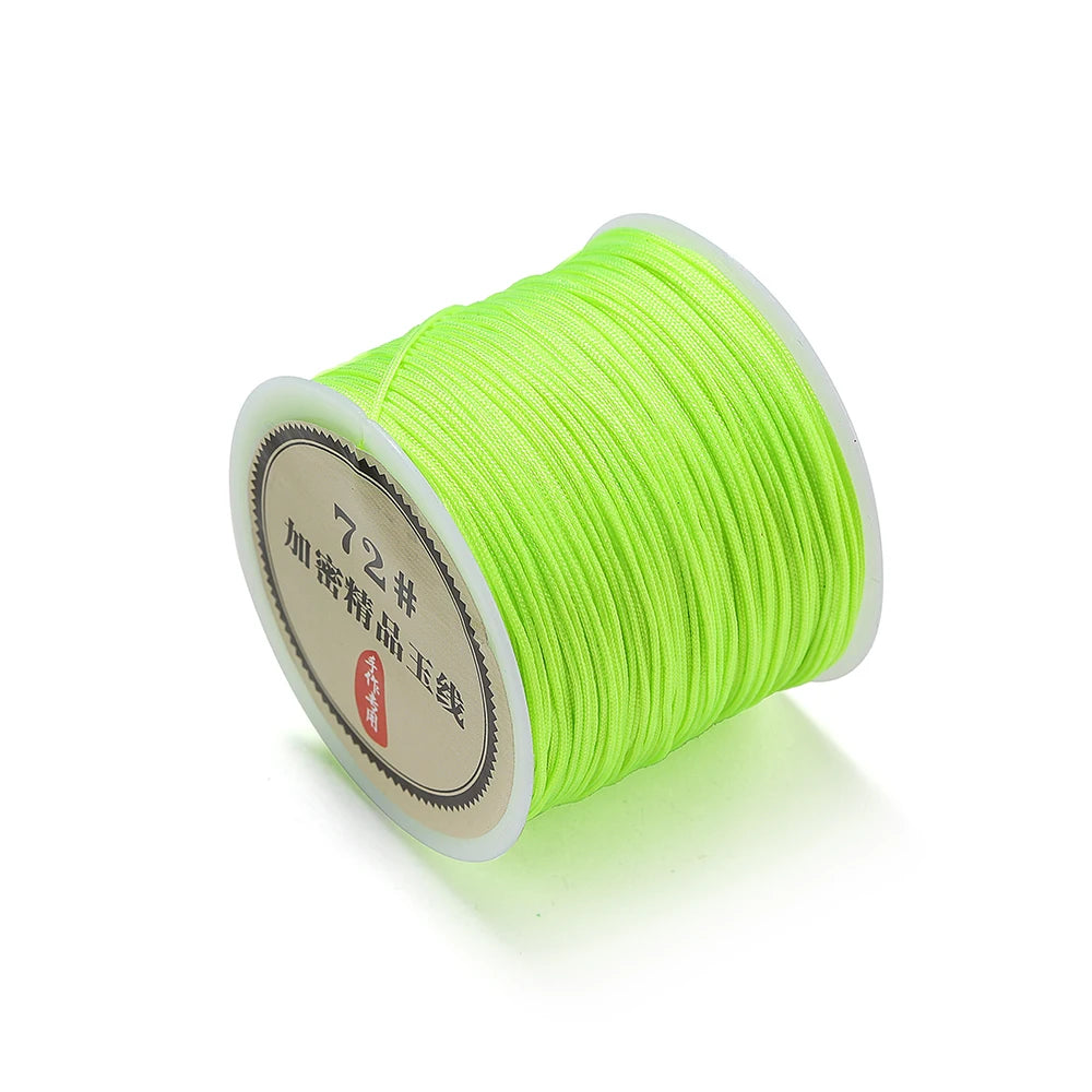 Spool of bright lime green 0.8mm nylon macramé cord for jewelry making