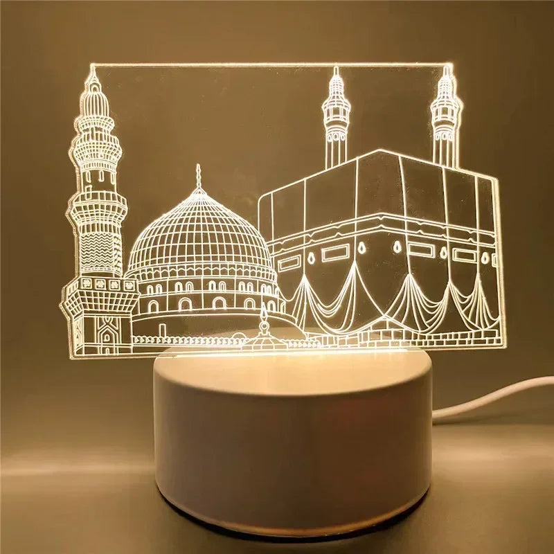 A glowing acrylic night light depicting a mosque silhouette with domes and minarets.