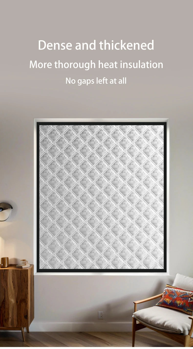 A close-up of a textured, quilted thermal insulated door curtain with a diamond pattern installed in a white frame.