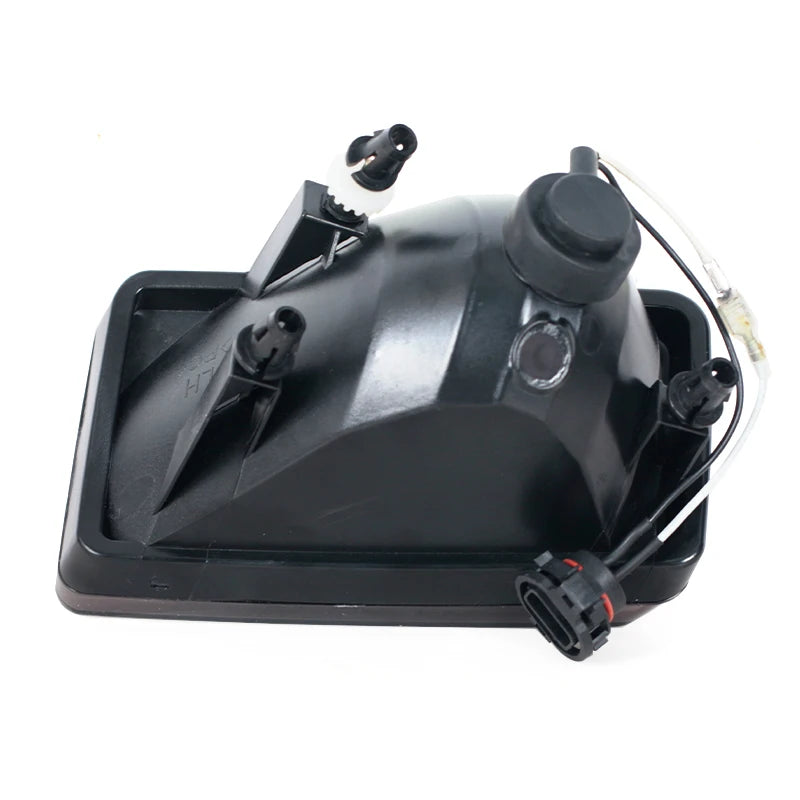 Black direct-fit fog light assembly for Chevy Silverado, Tahoe, Suburban, and Avalanche.
