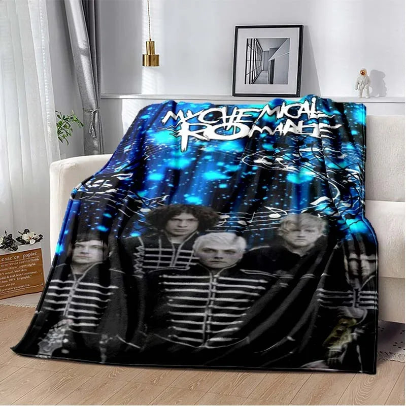 A dark blue and black fleece throw blanket featuring a My Chemical Romance band graphic.