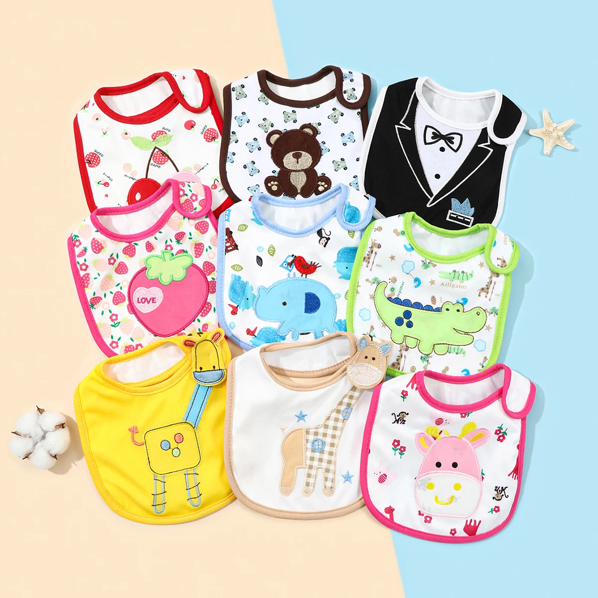 A set of waterproof baby bibs and burp cloths featuring various cartoon prints for infants.