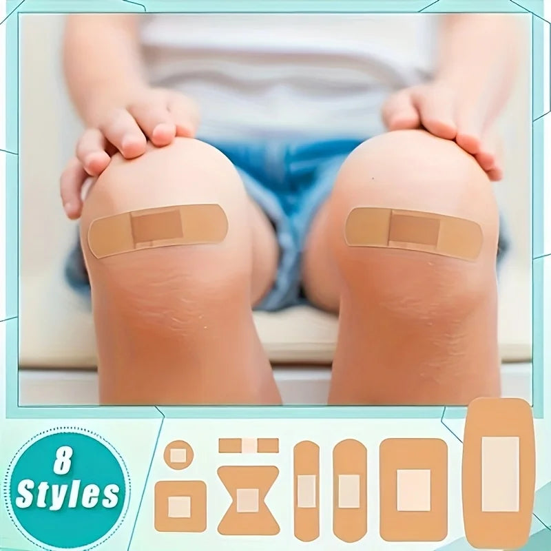 A child's knee is shown with several tan silicone rubber bandages applied to the skin.