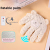 A soft, cream-colored palm-shaped baby sleep pillow with a breathable mesh layer on the reverse side.