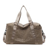 A taupe leopard print duffle bag with adjustable straps.
