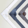 Magnetic window mosquito net in gray and white with a brown accent, shown diagonally.