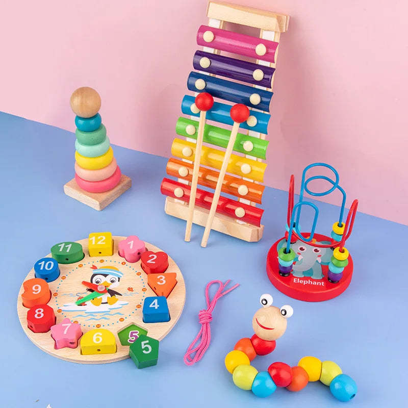 A set of colorful wooden puzzles and stacking toys including a tower, a puzzle board, and interlocking rings.