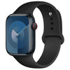 A black silicone sport band for an Apple Watch shown on a white background.