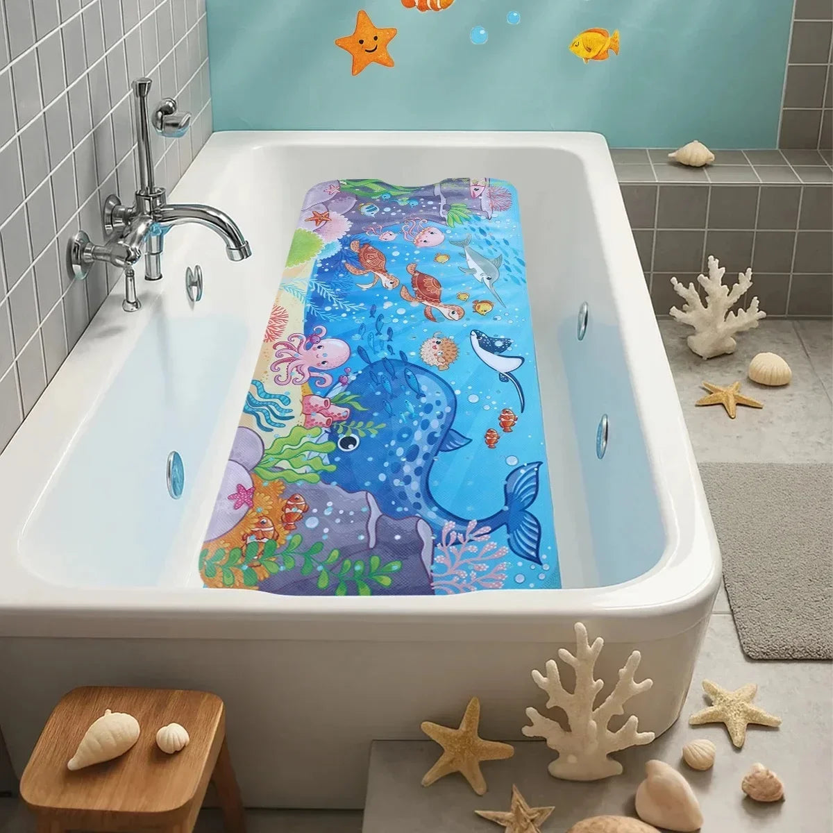 A white bathtub filled with blue water features a colorful cartoon mat with suction cups and starfish decorations.