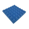 A pack of blue pyramid acoustic foam panels.
