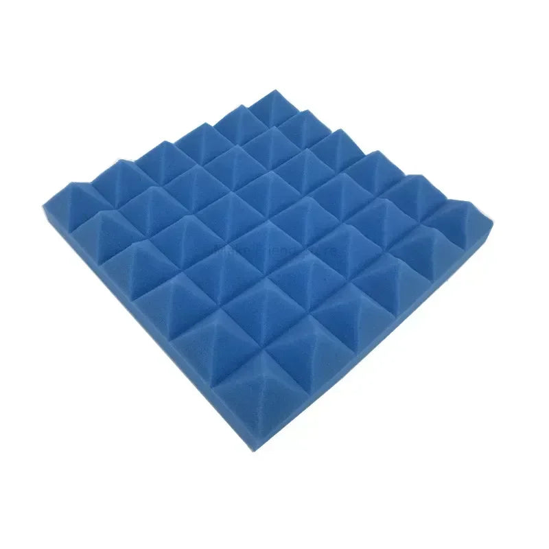 A pack of blue pyramid acoustic foam panels.