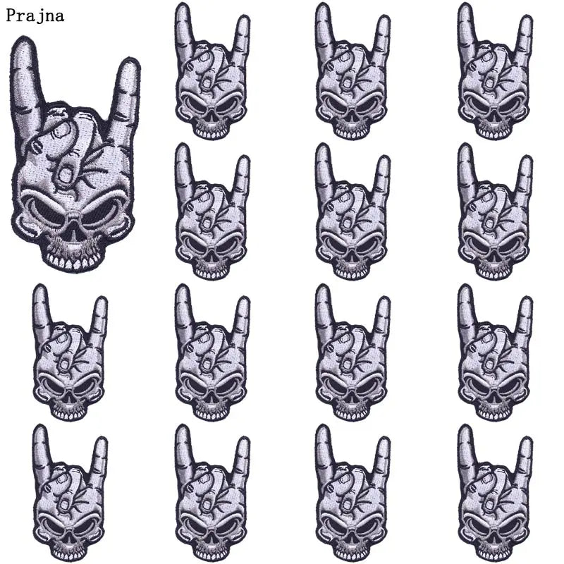 A set of ten embroidered iron-on patches featuring skulls with horns in various styles.