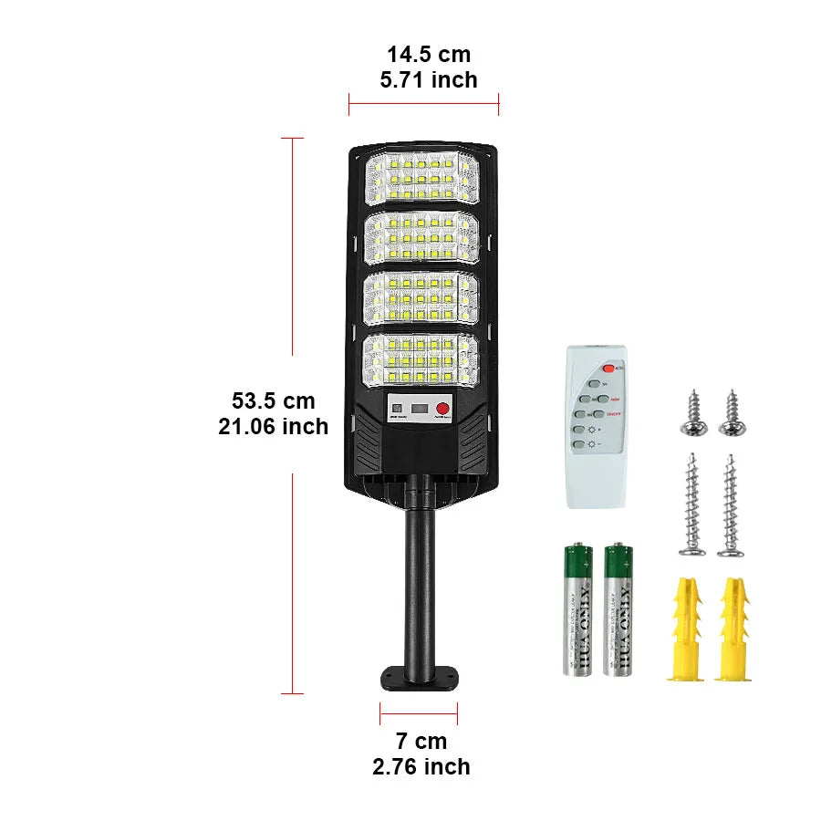 A black solar wall light fixture with multiple LED panels and a motion sensor, shown with accessories.