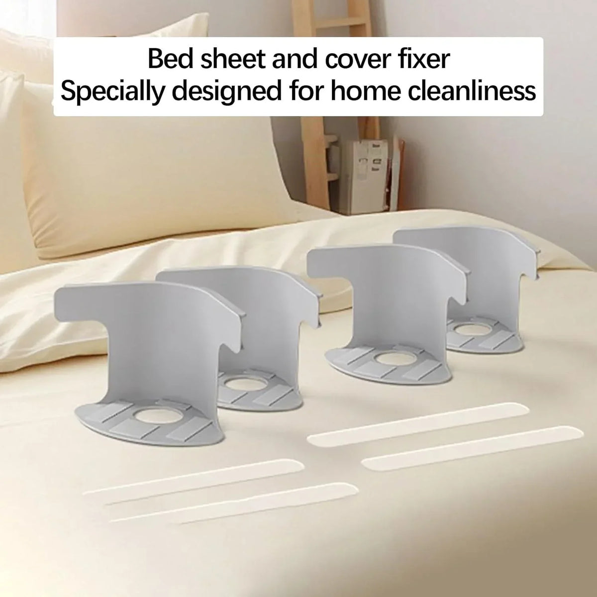 Draps et fixateurs de housse gris pour la propreté à la maison sur un lit.