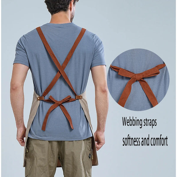 A man wearing a gray t-shirt and khaki pants with brown webbing straps tied in a bow, demonstrating the waterproof adjustable