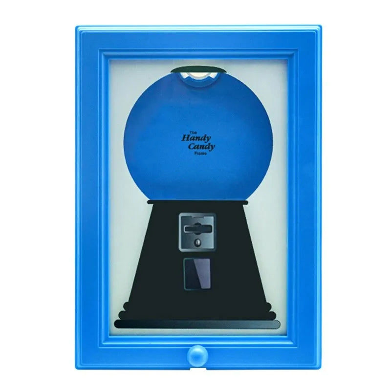 A vintage rotating candy display frame in blue, featuring a glass cover and a black base.