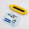 Yellow plastic RC car decorative accessories set including surfboard, kayak, and roadblocks