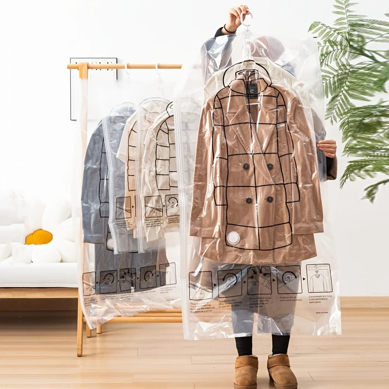 An extra-large hanging compression storage bag filled with winter clothing, including a brown jacket and gray pants.