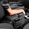 A hand rests on a black car armrest box with a storage pocket, designed to support arms and disperse elbow pressure.