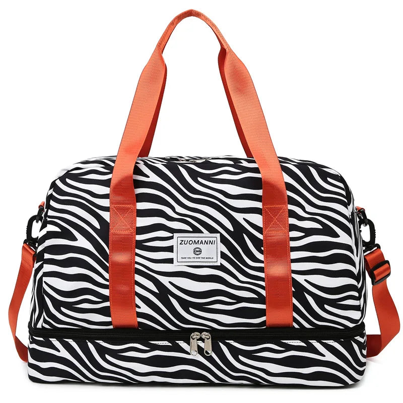 Orange and black zebra print waterproof duffle bag with wet dry compartments