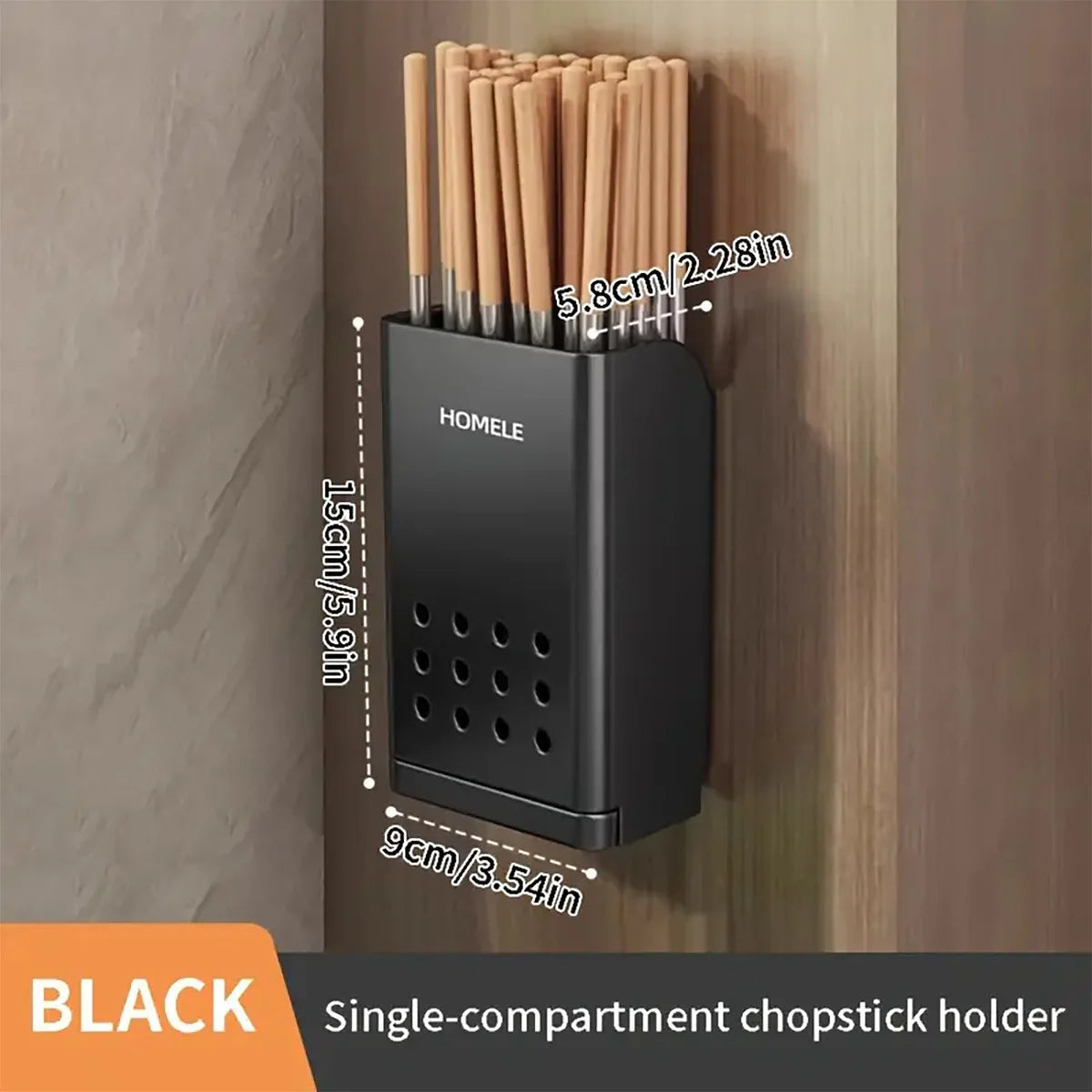 A black single-compartment chopstick holder mounted on a wooden surface.