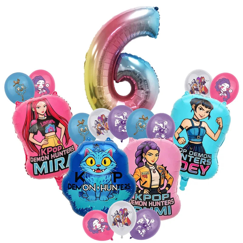 A set of pink and blue balloon decorations shaped like the number 6 and various character balloons for a music-themed birthda