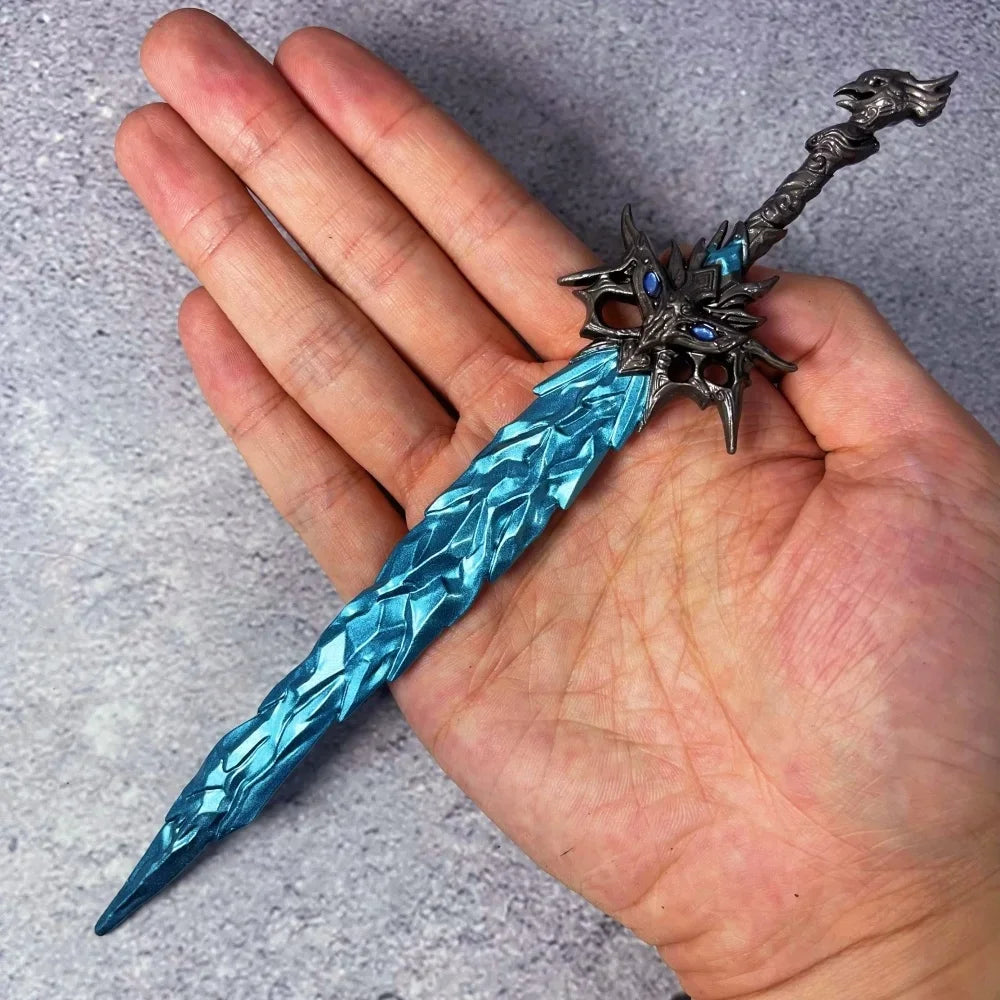 A full-size collectible metal katana sword with a blue blade and dark metal hilt is held in a person's hand.