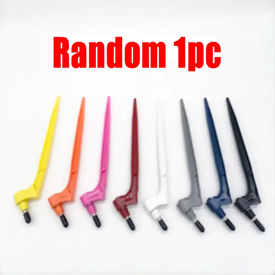A collection of various colored replacement blades for a 360° rotating precision craft knife.