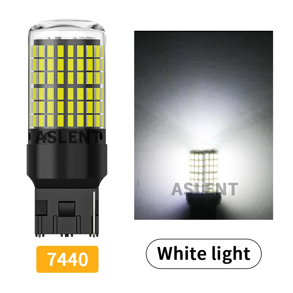 A bright white LED bulb with a cylindrical glass envelope and black base, labeled 7440.