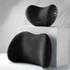 Black memory foam car headrest and lumbar support pillow set displayed on a white surface.