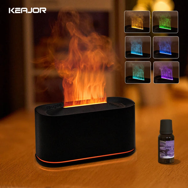 A black aroma essential oil flame humidifier diffuser with multiple colored light options displayed on a wooden surface.