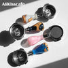 A collection of various colored stainless steel bottomless espresso portafilters for E61 machines.