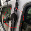 Close-up view of an inflatable air wedge tool being used to repair a car door or window.