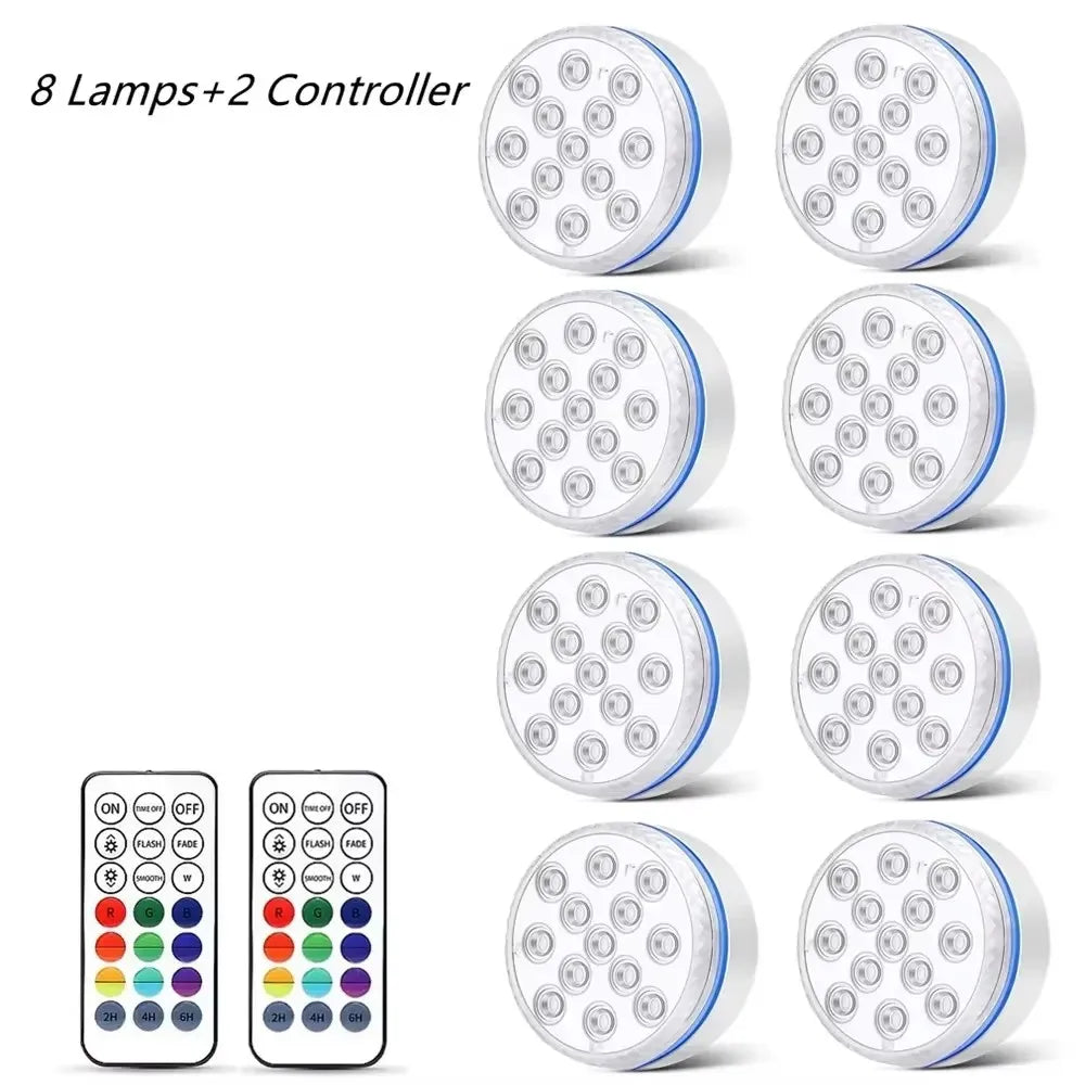 A set of eight submersible LED pool lights and two controllers for underwater lighting.