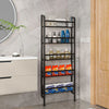 A black multi-tier storage rack with shelves holding various household items in a modern interior setting.