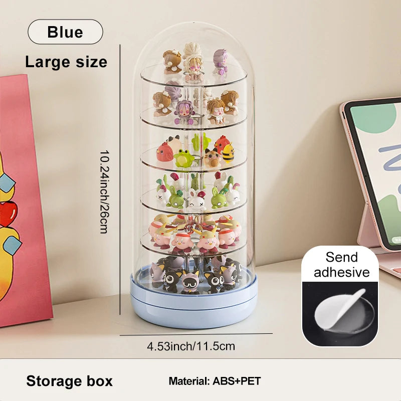 A blue transparent storage box displaying various small collectible figures and keepsakes.