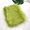 Bright lime green faux fur fabric used for DIY sewing, doll hair, and cosplay