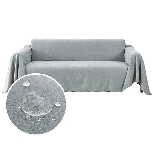 A light gray waterproof anti-slip sofa cover draped over a piece of furniture.