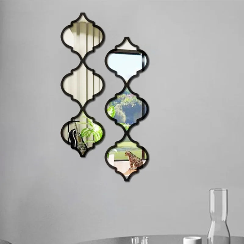 Moroccan-inspired decorative mirror wall stickers featuring five ornate, diamond-shaped mirrors on a gray wall.