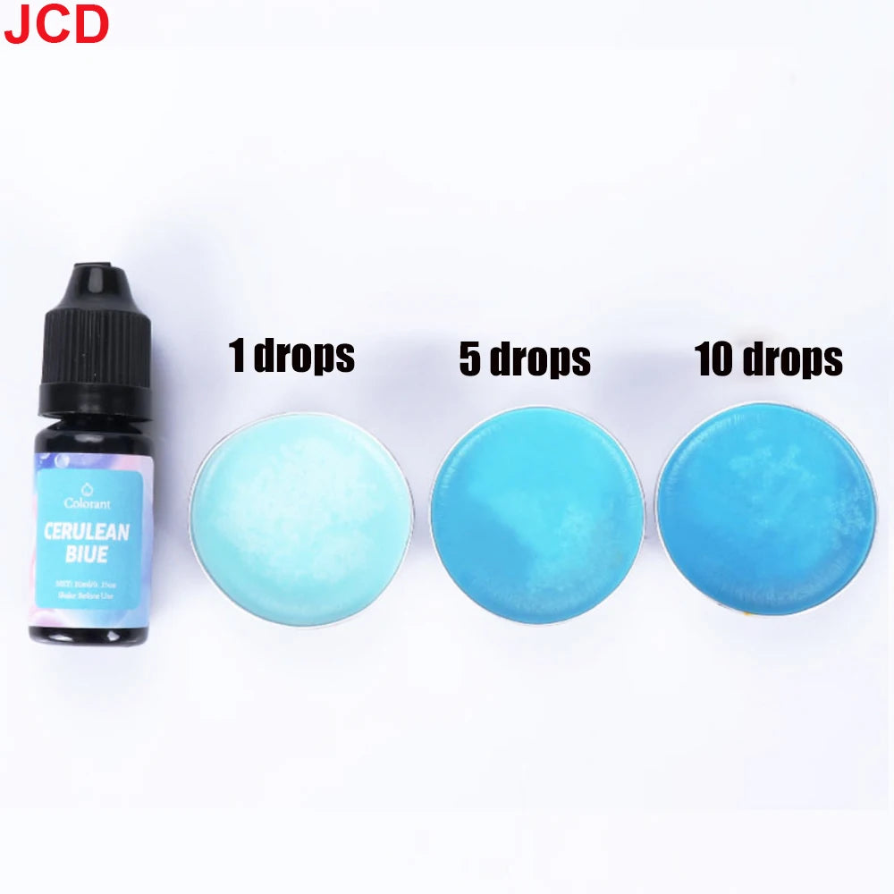 A set of Cerulean Blue liquid candle dye in dropper bottles showing 1, 5, and 10 drops of the blue color.