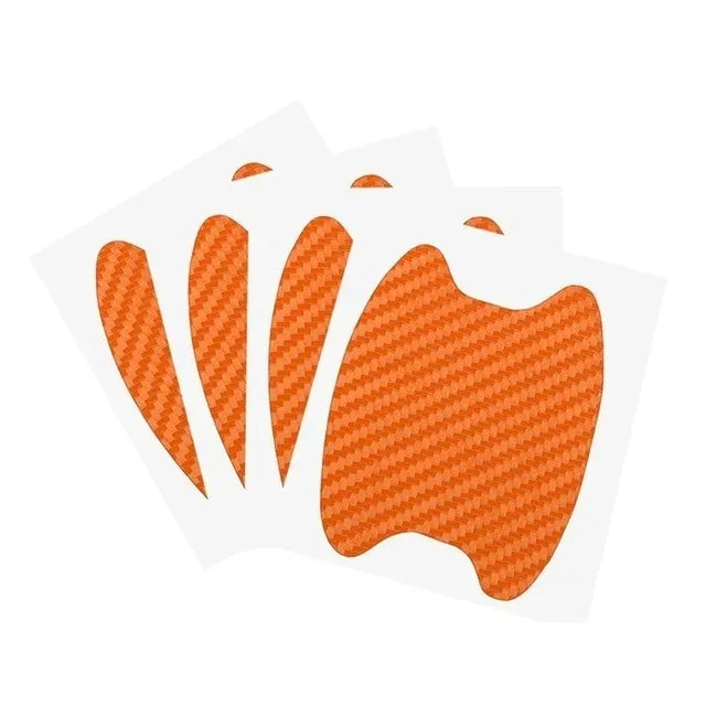 A pack of carbon fiber car door handle protector film shown in orange color.