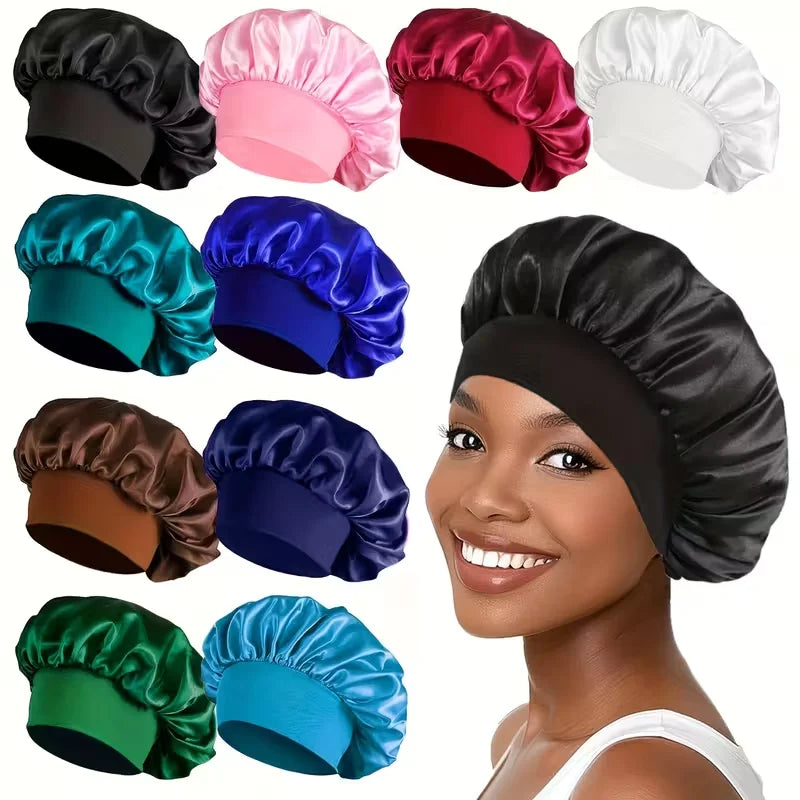 A collection of silk satin sleep bonnets in various colors including black pink red white teal and blue shown on a model's he