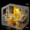 A miniature wooden dollhouse building kit featuring furniture and interior details.