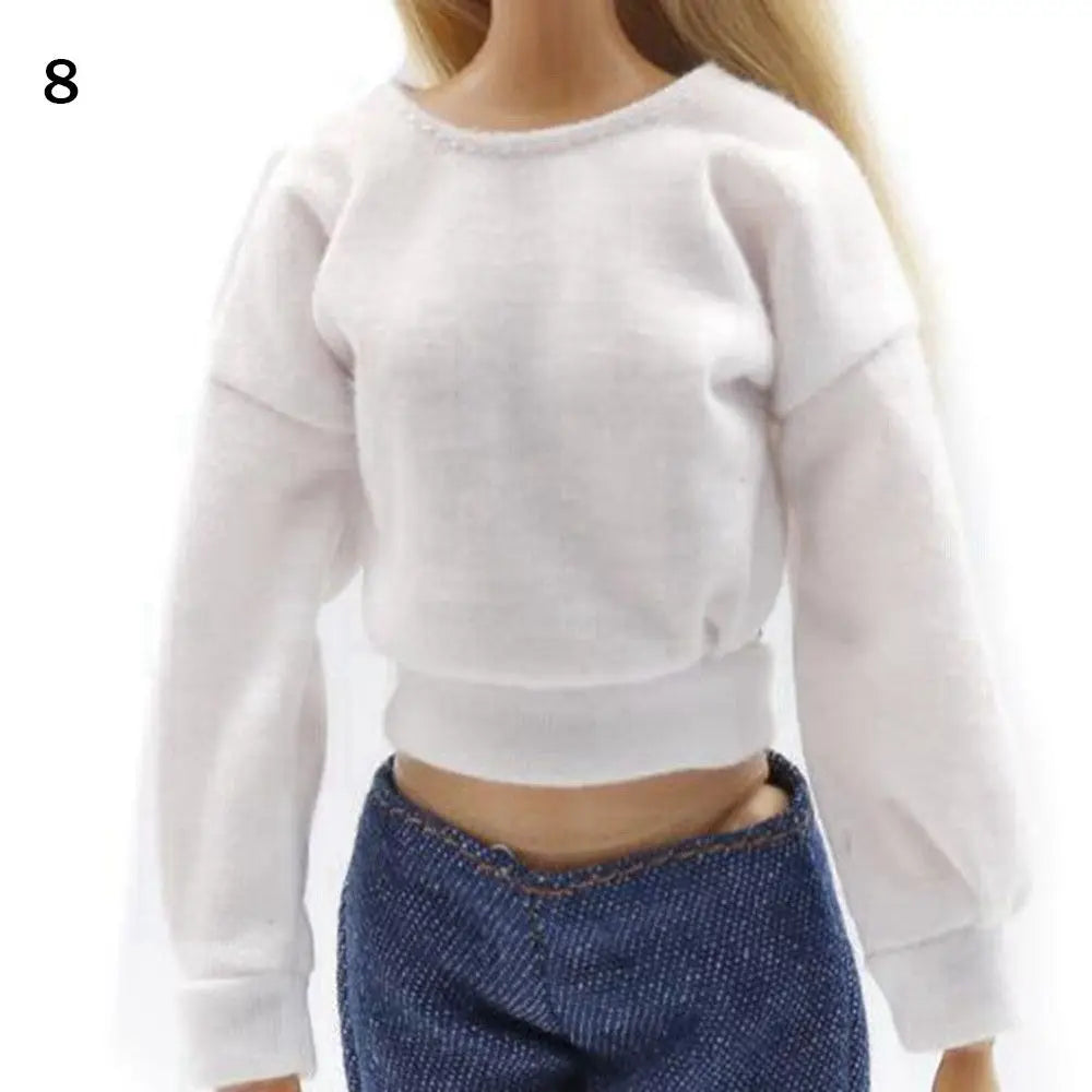A white long-sleeved cropped sweatshirt top for a fashion doll clothing set.