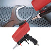 A red handheld pneumatic sandblasting gun with a black grip and a silver nozzle is shown next to a metal wrench.